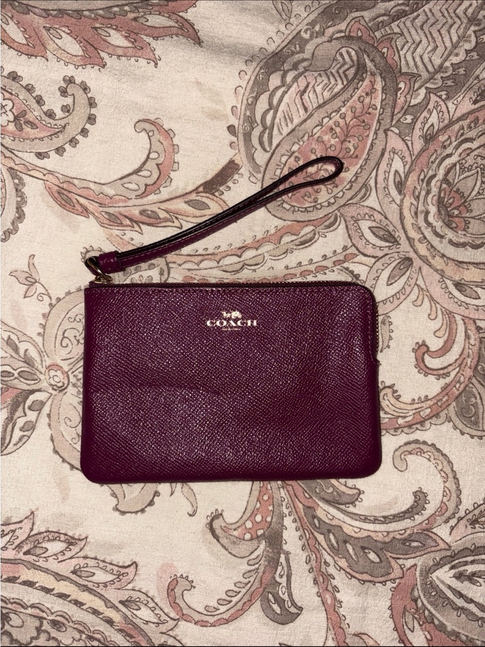 Coach Plum Wristlet with Gold Logo